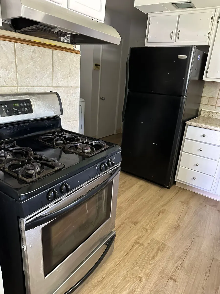 Clean kitchen with appliances